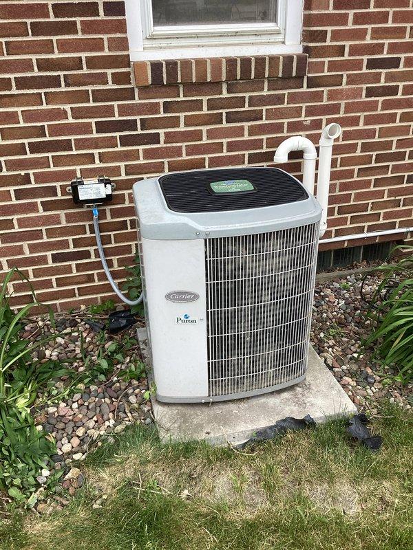 Responded to no-cooling complaint on Carrier Puron system. Diagnosed low refrigerant charge as cause of insufficient cooling capacity. Added refrigerant to manufacturer specifications and injected UV dye pack into system to facilitate future leak detection if necessary.
