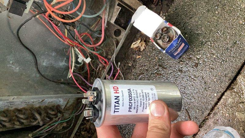 Responded to no cooling call at residential mobile home. Upon arrival, confirmed air conditioning system was running but discharging warm air instead of conditioned air. Diagnosed failed capacitor as root cause of cooling failure. Removed defective capacitor and installed new TITAN HD PRGD3535A replacement capacitor. Restored system to proper cooling operation and verified functionality before departure.