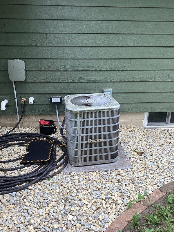 Responded to no cooling complaint at residential property. Upon arrival, performed diagnostic evaluation of outdoor condensing unit. Testing confirmed failed capacitor preventing compressor operation. Removed defective capacitor, installed replacement component, and verified proper system operation with normal cooling restored.