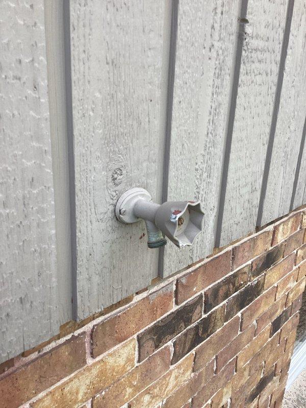 Responded to service call for leaking exterior hose bib. Upon arrival, confirmed active leak at outdoor water spigot mounted on exterior wall. Accessed plumbing connections from attic crawl space to isolate water supply. Removed failed hose bib fixture and installed new replacement unit, ensuring proper seal at wall penetration. Tested system for leaks and verified proper operation of new hose bib.