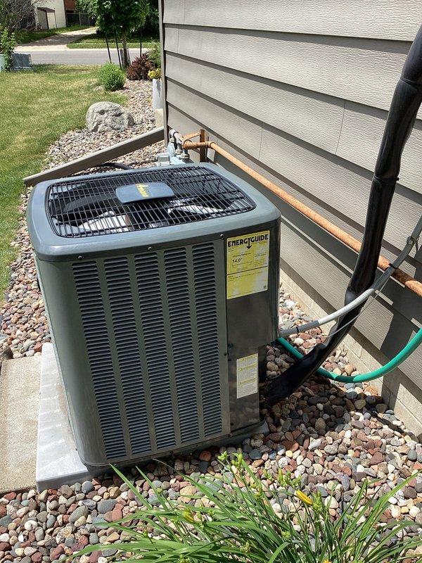Performed comprehensive air conditioning tune-up on outdoor condenser unit. Completed standard preventive maintenance procedures including system inspection, electrical testing with digital multimeter showing normal readings, and verification of refrigerant line insulation integrity. Unit operating within normal parameters upon completion.