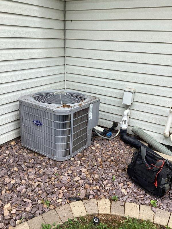 Responded to no cooling complaint on Carrier air conditioning system. Upon arrival, diagnosed failed heat exchanger in furnace and low refrigerant charge in AC unit. Presented customer with options for repair versus replacement of both furnace and air conditioning equipment due to extent of failures and system age.