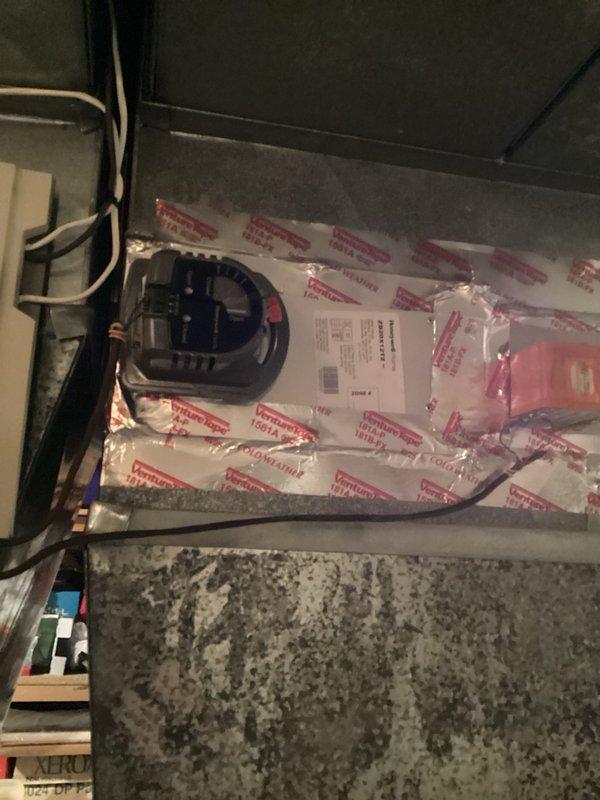Responded to service call for air conditioning system that would not stop running at set temperature and was producing loud noise. Diagnosed failed zone damper causing system malfunction. Removed defective zone damper from attic-mounted HVAC system and installed new replacement damper. Tested system operation to verify proper cycling and temperature control. Identified additional zone damper showing signs of wear and provided estimate for replacement to prevent future issues.