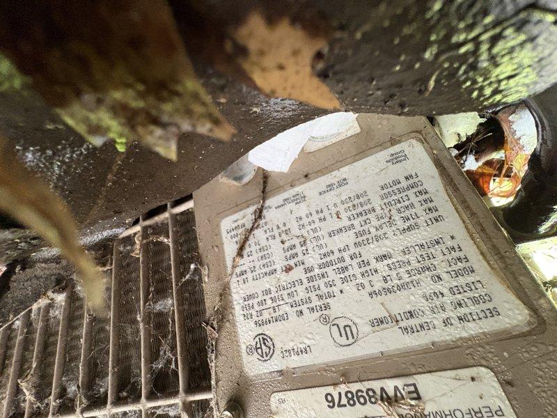 Responded to no cooling complaint and diagnosed system low on refrigerant. Upon inspection, determined the air conditioning system had a significant refrigerant leak that made repair uneconomical. Recommended and completed full system replacement, including outdoor condenser unit and indoor air handler, restoring proper cooling operation to the residence.