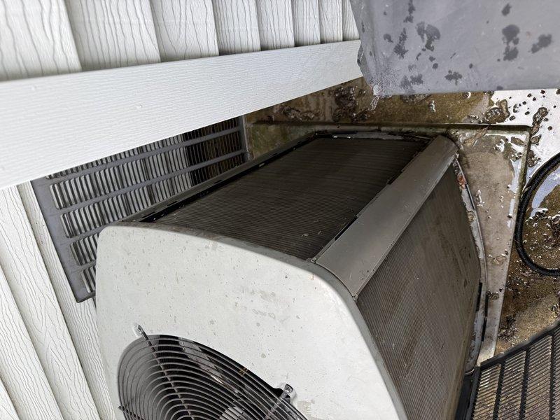 Responded to no cooling complaint with system icing up. Upon arrival, found extremely dirty air filter and heavily clogged condenser coil restricting airflow and causing freeze-up conditions. Cleaned condenser coil thoroughly to restore proper heat exchange and system operation.