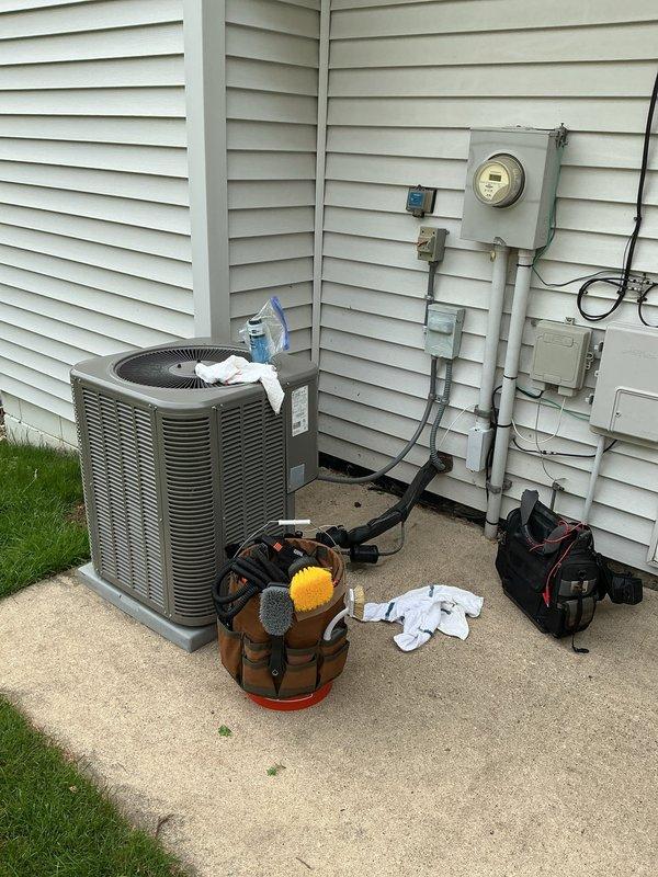 Responded to AC leak check service call. Upon inspection, identified refrigerant leak at the metering device. Tightened the collar connection and performed retest to confirm leak was successfully sealed and system integrity restored.