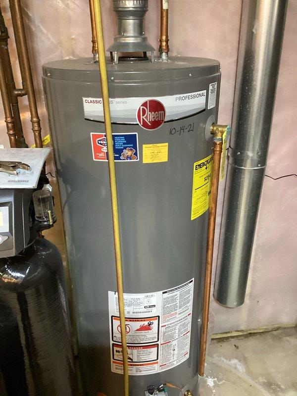 Responded to emergency call for pinhole leak in basement mechanical room near water shut-off. Upon inspection, identified failed copper 90-degree elbow fitting located immediately downstream of the water meter. Cut out compromised fitting and deteriorated pipe section, then installed new copper fittings and pipe to restore integrity of the water supply line. Restored water service to the residence and verified all connections for proper operation with no leaks detected.