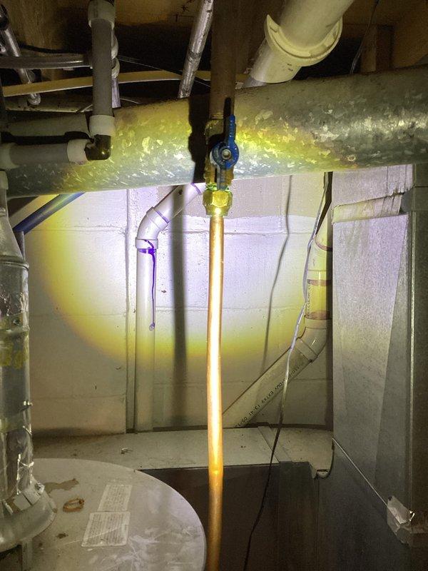 Responded to natural gas odor in mechanical room where utility company had previously disconnected and capped the gas line to the water heater at the shut-off valve. Performed comprehensive leak detection throughout the system with no leaks found. Reconnected the gas line from the shut-off valve to the water heater, restored gas service, and relit the water heater pilot. Conducted final leak detection testing to verify system integrity with no leaks detected, confirming safe operation of the water heater and gas system.