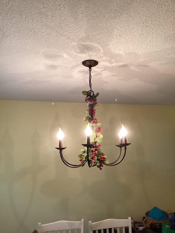 Completed electrical inspection for property. Assessed upstairs bathroom circuit and identified GFCI protection requirement for washing machine location to meet current electrical code standards. Evaluated downstairs decorative chandelier fixture for dimmer switch installation compatibility. All inspection items documented and GFCI installation needs communicated for code compliance.