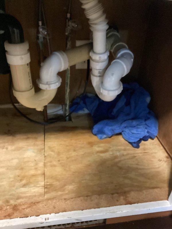 Responded to kitchen sink backup issue. Attempted to clear blockage using sink machine, running cable 25 feet through drain line without success. Blockage in drain line proved too severe for standard clearing equipment. Referred customer to specialized drain clearing service for advanced equipment and techniques needed to resolve the obstruction.