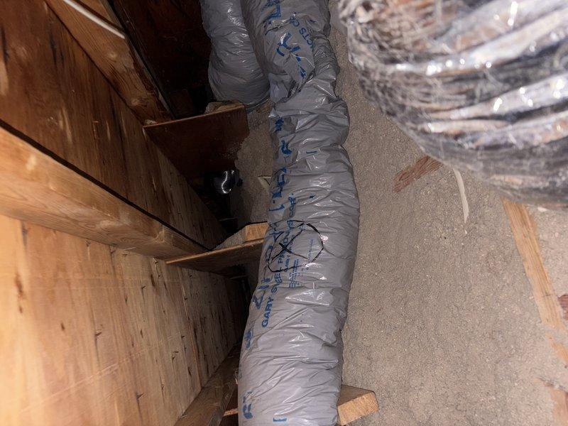 Responded to customer report of inadequate airflow to multiple rooms. Inspected attic-mounted HVAC system and identified three failed flexible duct runs, including two completely collapsed flex lines and one run with missing insulation causing significant thermal loss. Replaced all three compromised duct runs with properly insulated flexible ductwork, secured with appropriate hangers and metal straps to wooden framing. Verified airflow restoration to affected rooms and ensured all connections were properly sealed.