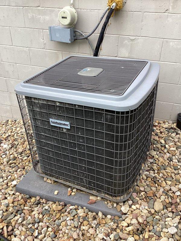 Performed comprehensive one-time air conditioning tune-up on ComfortMaker condenser unit and associated indoor HVAC system components. Completed standard maintenance procedures including inspection of outdoor unit, refrigerant lines, electrical connections, and indoor air handler with Aprilaire humidification system. All equipment found operating within normal parameters with no deficiencies noted.