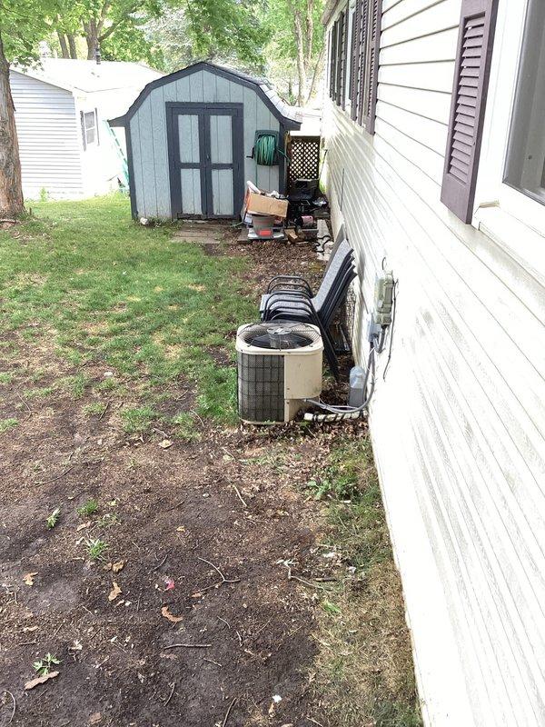 Responded to no cooling call on residential air conditioning system. Upon arrival, confirmed outdoor condensing unit was not operating. Diagnostic testing revealed failed dual run capacitor and tripped high pressure switch. Accessed electrical compartment and inspected internal wiring and components. Due to age of system (10+ years), replacement parts are no longer available from manufacturer. Advised customer that complete system replacement is necessary as repair is not feasible. Unit cannot be restored to operation without unavailable components.