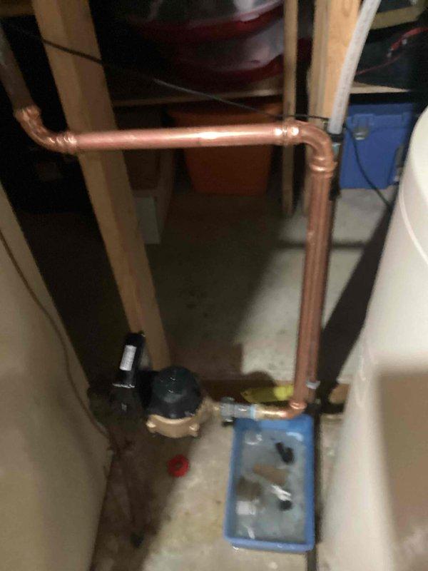 Responded to emergency call for multiple pinhole leaks on the main copper water line entering the residence. Upon arrival, found that the homeowner had temporarily patched the leaks with silicone tape but required a permanent repair solution. Located the pinhole leaks on the copper water main immediately after the meter.

Shut off the main water supply and relieved system pressure. Cut out the compromised section of copper pipe and damaged fittings. Installed new copper pipe and fittings to replace the deteriorated section, ensuring proper measurements and secure connections. Soldered all joints to manufacturer specifications.

Restored water service to the home and conducted thorough pressure testing. Verified all connections were leak-free and system operated correctly. All plumbing fixtures throughout the residence functioned properly with restored water pressure and no leaks detected at the repair site.