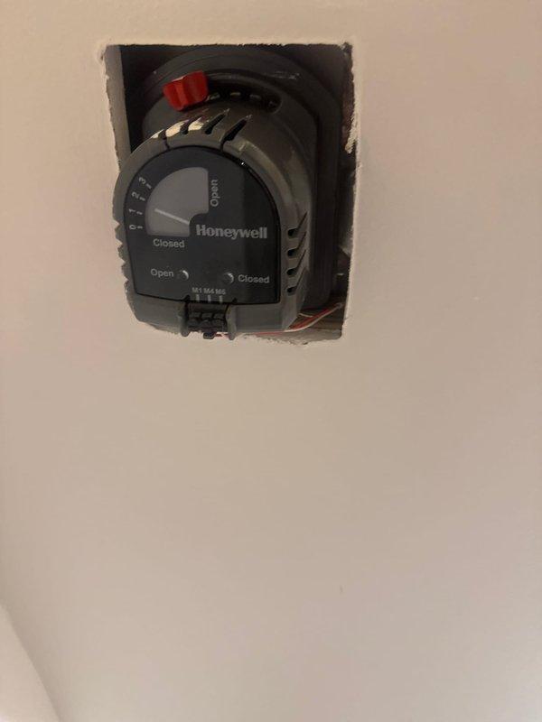 Responded to service call for a three-zone HVAC system with one zone failing to cool properly. Diagnosed a malfunctioning zone actuator that was sticking and preventing the damper from opening. Replaced the defective Honeywell zone actuator with new unit, verified proper damper operation through full open and closed cycles, and tested system to confirm restored functionality to the affected zone.