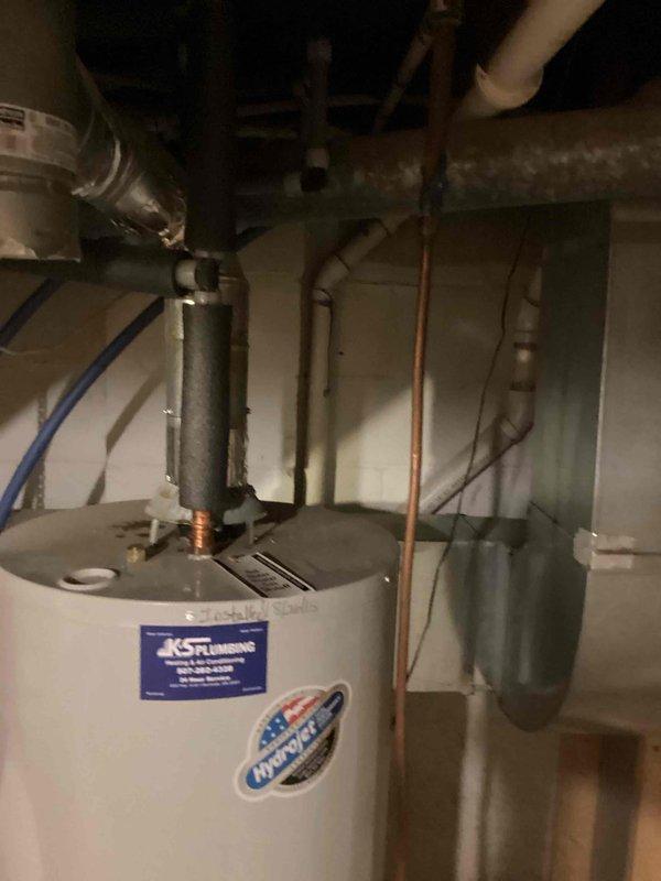 Responded to callback for gas odor in mechanical room following previous repair. Upon inspection, identified small leak at soft copper gas supply line connection to water heater tee and dirt leg fitting. Removed compromised nut, applied thread compound to threads, and reinstalled gas line connection. Performed comprehensive leak detection on both furnace and water heater gas supply lines, confirming all connections are secure with no detectable leaks present.