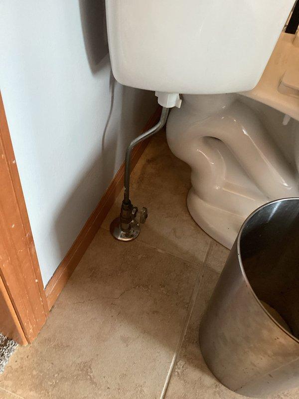 Responded to service call for toilet reported to be constantly running with leaking underneath. Upon inspection, identified leak originating from loose water supply line connection at toilet fill valve. Tightened supply line connection to resolve leak. Inspected additional toilets throughout residence as requested. All plumbing connections secured and functioning properly upon completion.