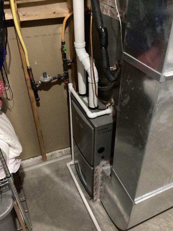 Responded to service call for refrigerant leak search on HVAC system. Located active leak at liquid line connection point where it meets the evaporator coil, evidenced by corrosion and oxidation on copper piping. Successfully pumped down the system, repaired the leak at the liquid line connection, and documented the corroded components with photographs for service records.