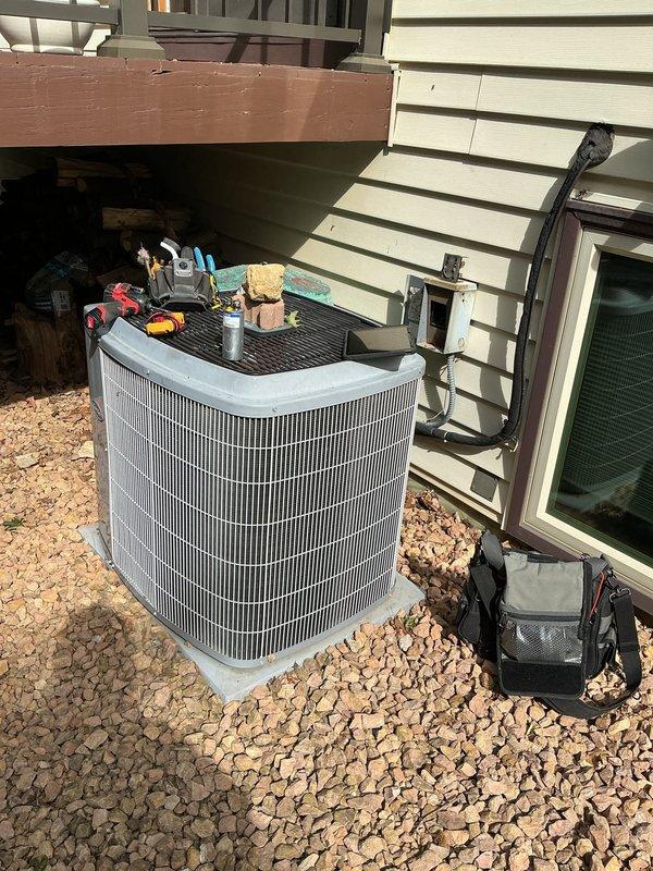 Responded to no cooling call with reported burning smell from outdoor unit. Upon inspection, diagnosed failed outdoor capacitor on 10+ year old air conditioning system. Replaced defective capacitor, restoring proper operation to the condenser unit and resolving the no cool condition.