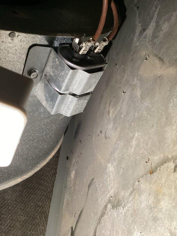 Responded to no-cool call on residential HVAC system where outdoor unit fan was not operating. Diagnosed failed dual run capacitor preventing condenser fan motor operation. Replaced defective capacitor with new unit, restored system to proper operation, and verified cooling cycle functionality.