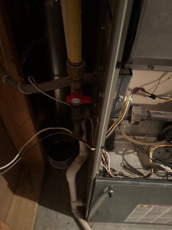 Responded to service call for second opinion on furnace diagnosis. Upon arrival, performed thorough inspection of heating system and confirmed presence of cracked heat exchanger, which poses potential safety hazard due to possible carbon monoxide leakage. Additionally identified clogged evaporator coil restricting airflow and reducing system efficiency. Documented findings with photographic evidence showing internal mechanical components, piping assembly, electrical connections, heat exchanger fins, and coil condition. Reviewed safety concerns with occupant regarding cracked heat exchanger and recommended immediate system replacement. Scheduled follow-up appointment with project manager to provide complete system replacement estimate and discuss available equipment options.