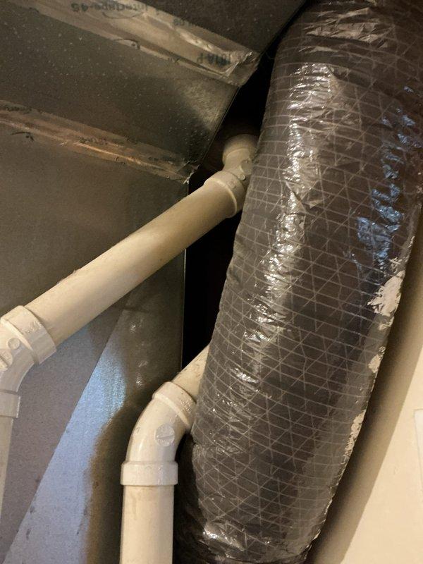 Responded to no cooling complaint on residential air conditioning system. Upon inspection, discovered dirty blower assembly restricting airflow and low refrigerant charge affecting system performance. Documented existing conditions with photos showing HVAC components in attic space, including damaged flexible ductwork with compromised insulation and condensate drain piping. Provided repair quote for cleaning blower assembly and recharging refrigerant system. Customer opted to explore replacement options with project manager due to extent of issues identified.