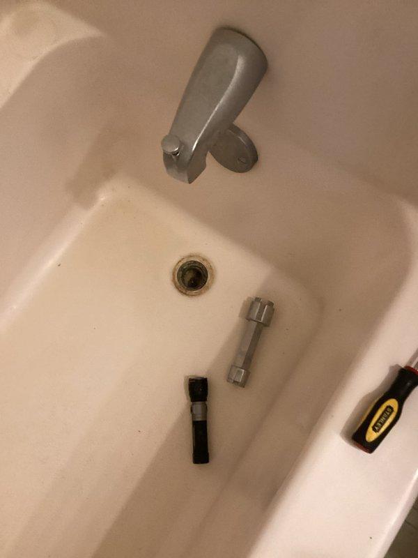 Responded to service call for master bathtub drain issue. Removed deteriorated lift and turn drain assembly that had dried out and was no longer functioning properly. Installed new lift and turn drain assembly with fresh gasket and plumber's putty to ensure proper seal. Tested system by running water through tub drain and verified complete functionality with no leaks detected.