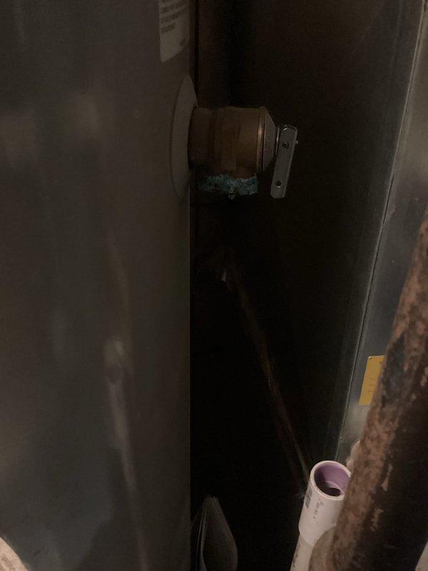 Responded to water heater T&P valve leak caused by spring mechanism stuck in open position, resulting in continuous water discharge. Removed failed temperature and pressure relief valve and installed new replacement unit, restoring proper function and eliminating leak. Advised homeowner to add crystal salt to water softener system for optimal performance.