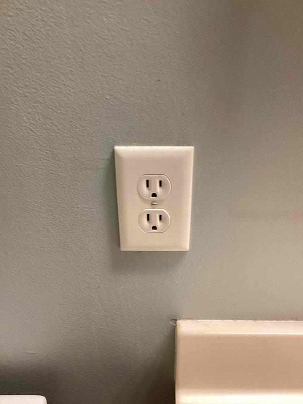 Completed installation estimate for GFCI outlet in bathroom and provided assessment for gas line bonding requirements at meter. Documented existing electrical panel configuration and newly installed standard duplex receptacle with proper grounding.
