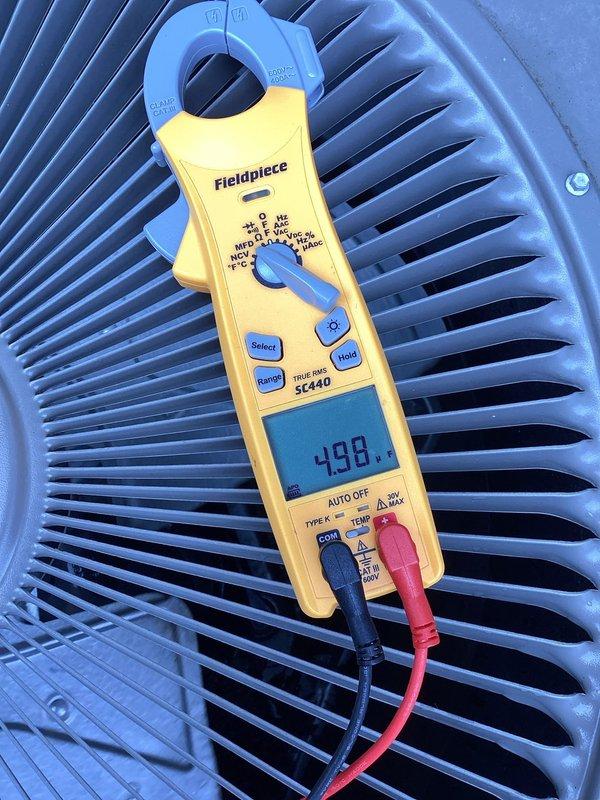 Completed routine preventive maintenance on residential air conditioning system. Performed comprehensive tune-up including electrical measurements with amperage readings at 498, verified system operating temperatures, and inspected outdoor condenser unit. All components found operating within normal parameters.