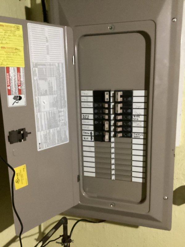 Responded to service call for non-functional electrical outlet being used with portable air conditioning unit. Upon inspection, determined that the existing outlet circuit was insufficient to handle the electrical load requirements of the AC unit. Installed new dedicated circuit with appropriate amperage capacity and replaced the outlet to safely accommodate the portable air conditioner, ensuring compliance with electrical code requirements for high-draw appliances.