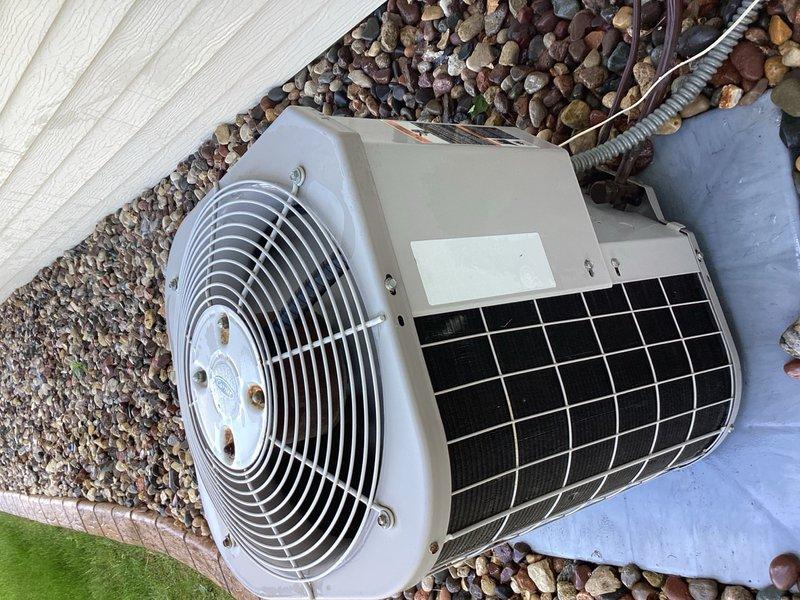 Completed comprehensive air conditioning tune-up on outdoor condenser unit. Performed standard maintenance procedures including inspection of cylindrical fan assembly, condenser coils, electrical connections, and refrigerant levels. Unit found to be operating within normal parameters with no deficiencies identified or repairs required.