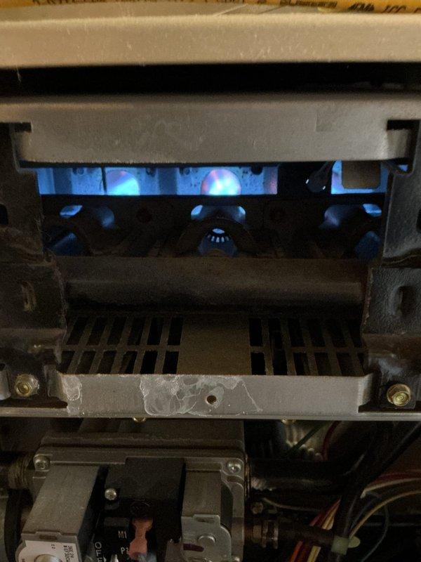 Performed comprehensive furnace tune-up and seasonal maintenance inspection. Verified proper gas combustion with blue flame pattern, inspected burner assembly and heat exchanger, tested all safety controls, and confirmed system operation within manufacturer specifications. Unit found in good working condition with no deficiencies noted.