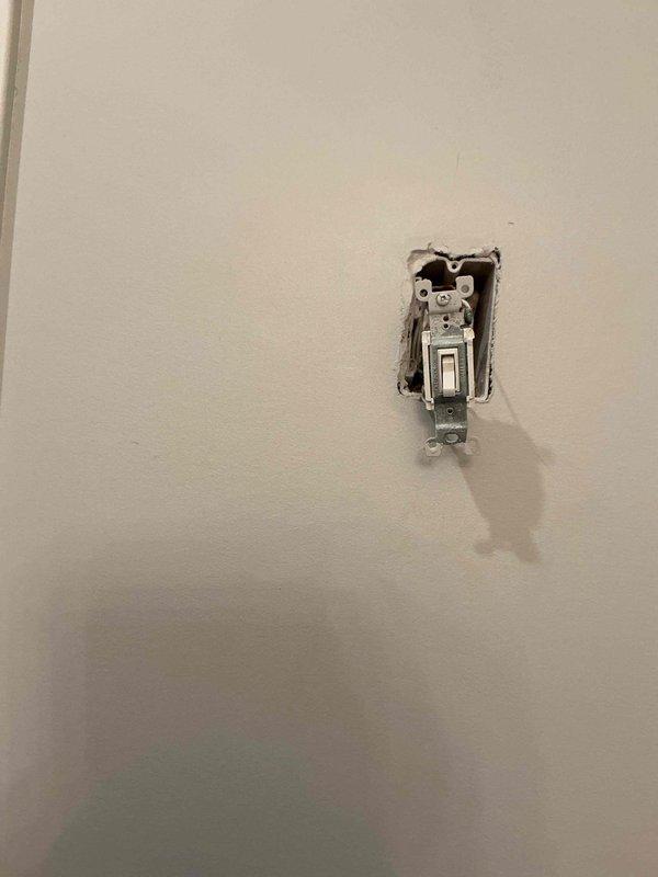 Responded to a malfunctioning light switch at the top of a stairway that was producing a buzzing sound and causing the light to turn off immediately after being activated. Diagnosed a faulty switch in a three-way switching configuration, as the downstairs switch controlling the same circuit remained operational. Removed the defective switch and installed a new replacement switch, restoring full functionality to the stairway lighting system.