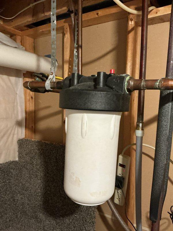 Performed scheduled maintenance on WaterRight water softener system, including comprehensive inspection, tank purge, and cleaning with professional water softener cleaner. Replaced sediment filter with customer-supplied unit and verified all copper plumbing connections, control valves, and digital control head were functioning properly. System tested and found operating within normal parameters with no deficiencies identified.