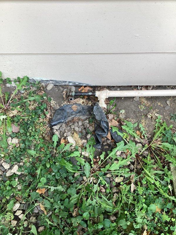 Responded to a request to permanently decommission an unused gas supply line. Located and accessed the 1/2" black iron gas pipe that previously supplied a garage space heater no longer in service. Cut the gas line at an appropriate location and installed a proper cap fitting to seal the line, ensuring no potential for gas leakage. Completed work from the exterior penetration point through to the interior garage connection, rendering the abandoned line safe and code-compliant.