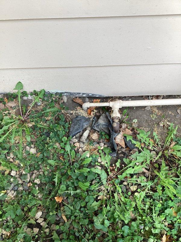 Responded to a request to permanently decommission an unused gas supply line. Located and accessed the 1/2" black iron gas pipe that previously supplied a garage space heater no longer in service. Cut the gas line at an appropriate location and installed a proper cap fitting to seal the line, ensuring no potential for gas leakage. Completed work from the exterior penetration point through to the interior garage connection, rendering the abandoned line safe and code-compliant.