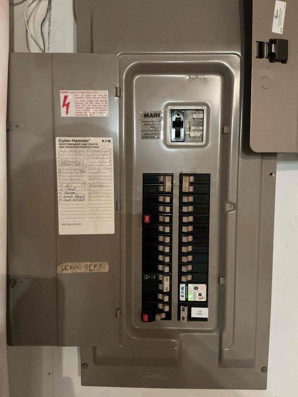 Responded to electrical hazard in garage where existing GFCI outlet had failed due to overheating and charring. Removed damaged receptacle, inspected circuit wiring for heat damage, and installed new GFCI outlet to restore safe power supply and ground fault protection to the garage circuit.