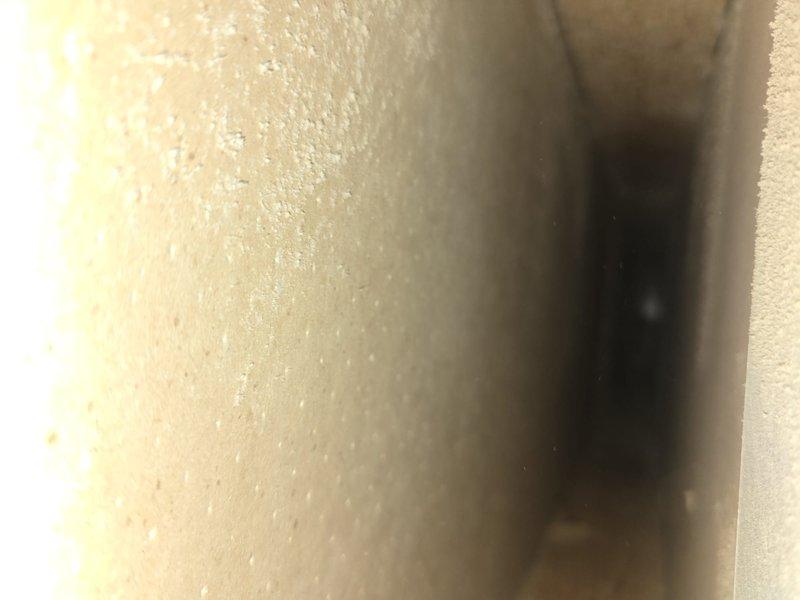 Performed comprehensive duct cleaning service with arrival notification provided prior to appointment. System inspection revealed moderate dust accumulation throughout the ductwork and on the blower wheel assembly. Cleaned all supply and return vents, removed debris from blower housing, and restored proper airflow throughout the HVAC system.