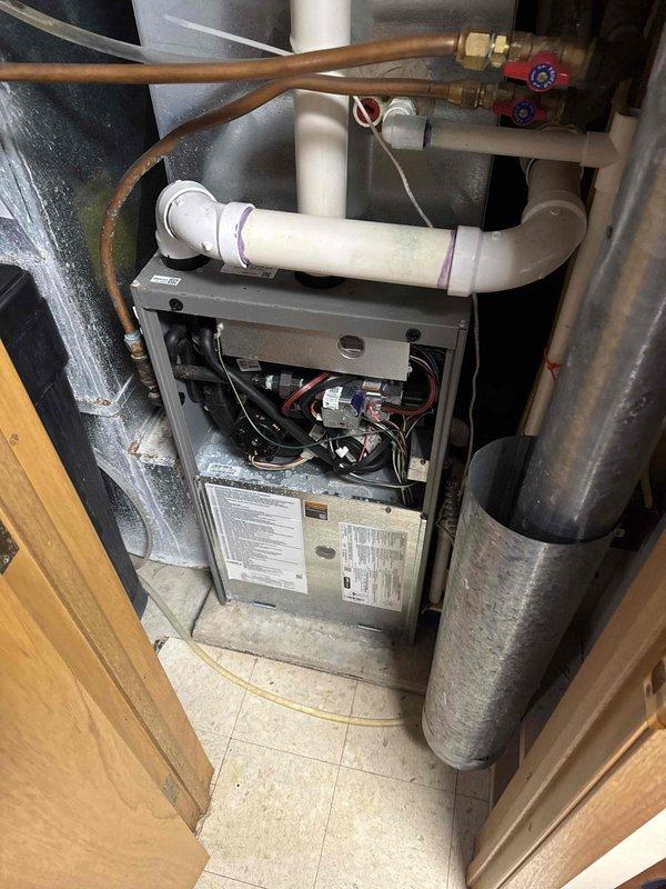 Performed comprehensive AC and furnace maintenance tune-up on residential HVAC system. Upon inspection, discovered heavily soiled air filter restricting airflow and a weak capacitor showing visible corrosion on terminals. Replaced the contaminated filter with new unit to restore proper airflow and system efficiency. Removed and replaced the failing capacitor to prevent potential system failure and ensure reliable operation. System tested and confirmed operational following component replacements.
