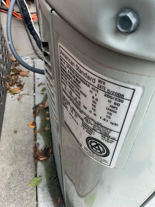 Responded to no cooling complaint on American Standard air conditioning unit. Diagnosed failed capacitor preventing compressor operation. Replaced defective dual run capacitor with new TITAN HD capacitor, restoring proper system function and cooling capability.
