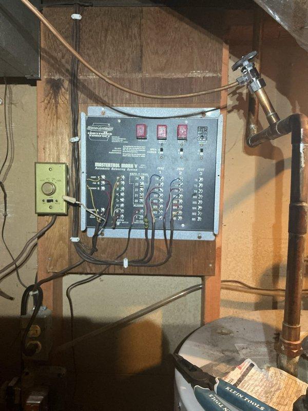 Completed installation of multi-zone HVAC damper control system in residential property. Installed zone control panel with automatic humidity management capabilities, wired multiple zone dampers throughout ductwork system, and integrated electrical controls to existing HVAC infrastructure. System tested and operational with all zones responding properly to thermostat commands.