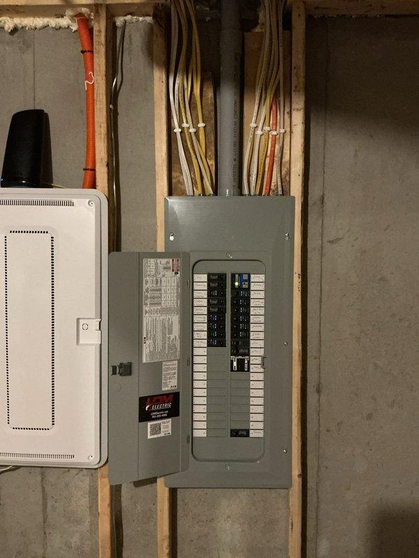 Performed site assessment for gas-to-electric dryer conversion in unfinished basement laundry area. Evaluated existing electrical panel capacity and determined routing requirements for new dedicated circuit. Proposed installation plan includes running exterior conduit from main electrical panel to laundry room location to accommodate 240V dryer circuit, with conduit penetration through exterior wall and interior routing to appliance location.