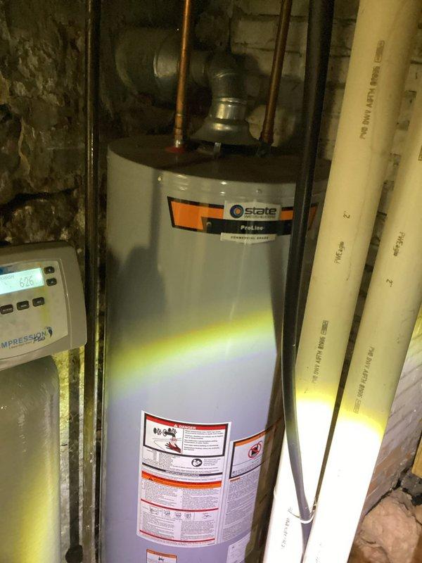 Responded to service call for water softener not dispensing salt despite operational dials. Diagnosed salt bridge formation in brine tank preventing proper regeneration cycle. Broke up salt bridge, initiated manual regeneration cycle, and verified system returned to normal operation with proper salt dispensing and softening functionality.