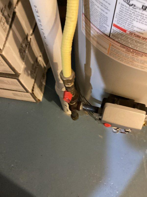Completed comprehensive plumbing inspection of residential property, arriving at rescheduled 6pm appointment time. Thoroughly examined utility room gas line assembly including yellow CSST flexible gas piping with brass fittings and red shut-off valve, as well as under-sink plumbing infrastructure featuring supply line connections, P-trap configuration, and fixture mounting. Documented all findings with photographic evidence for record-keeping purposes.