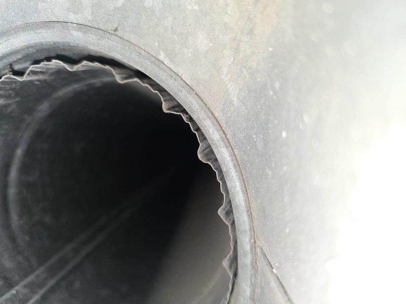 Completed comprehensive duct cleaning service to remove accumulated dust and debris from the HVAC system. Thoroughly cleaned all accessible ductwork and vents, removing buildup visible on interior duct surfaces and flexible duct connections. All vents were cleaned and system restored to proper operating condition.