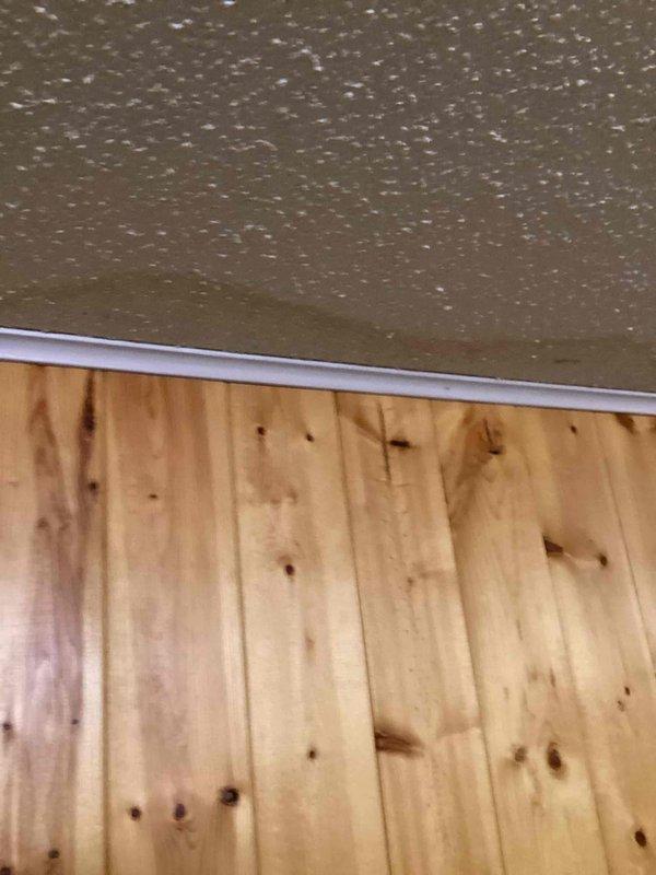 Responded to water leak call and arrived on site during scheduled window. Upon inspection, discovered burst outdoor hose bibb that caused significant water damage in basement area. Documented damage with photographs showing affected ceiling and wall surfaces. Restoration company is currently addressing water damage and will expose the hose bibb water line by opening the ceiling. Follow-up appointment will be scheduled once restoration work provides access to replace the failed outdoor hose bibb.