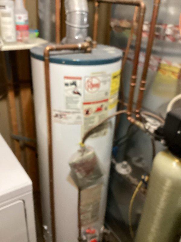 Responded to service call for leaking water heater with water supply shut off at property. Assessed existing 40-gallon natural gas atmospheric vent water heater in mechanical room and confirmed active leak requiring replacement. Provided estimate for installation of new 40-gallon natural gas atmospheric vent water heater with proper venting and plumbing connections.