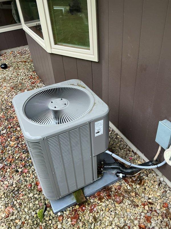 Responded to service call for malfunctioning outdoor condensing unit. Upon inspection, diagnosed failed condenser fan motor with loose shaft inside motor housing preventing proper operation. Replaced defective condenser fan motor under warranty coverage. Verified proper fan operation, airflow, and unit functionality upon completion. System restored to normal operating condition.