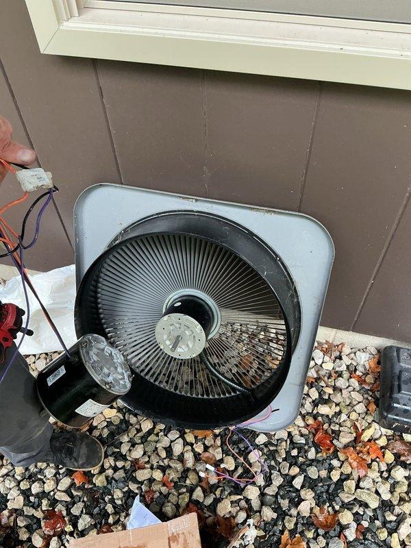 Responded to service call for malfunctioning outdoor condensing unit. Upon inspection, diagnosed failed condenser fan motor with loose shaft inside motor housing preventing proper operation. Replaced defective condenser fan motor under warranty coverage. Verified proper fan operation, airflow, and unit functionality upon completion. System restored to normal operating condition.
